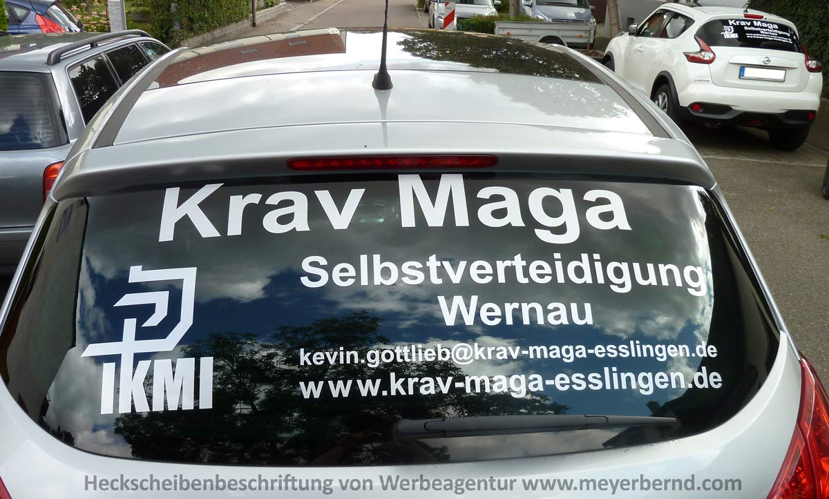 Heckscheibenbeschriftung in Wagenfarbe für Krav Maga Esslingen in Wernau